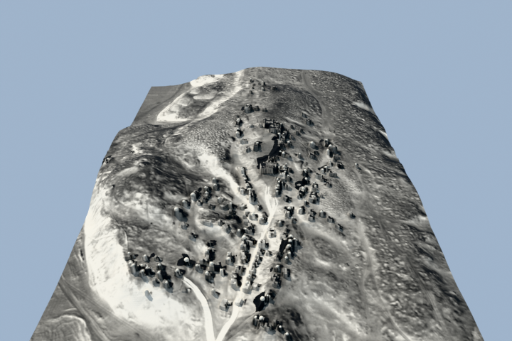A rendered 3D view of several chapels at eye level, showing real building height and roofline variation derived from the DEM differential